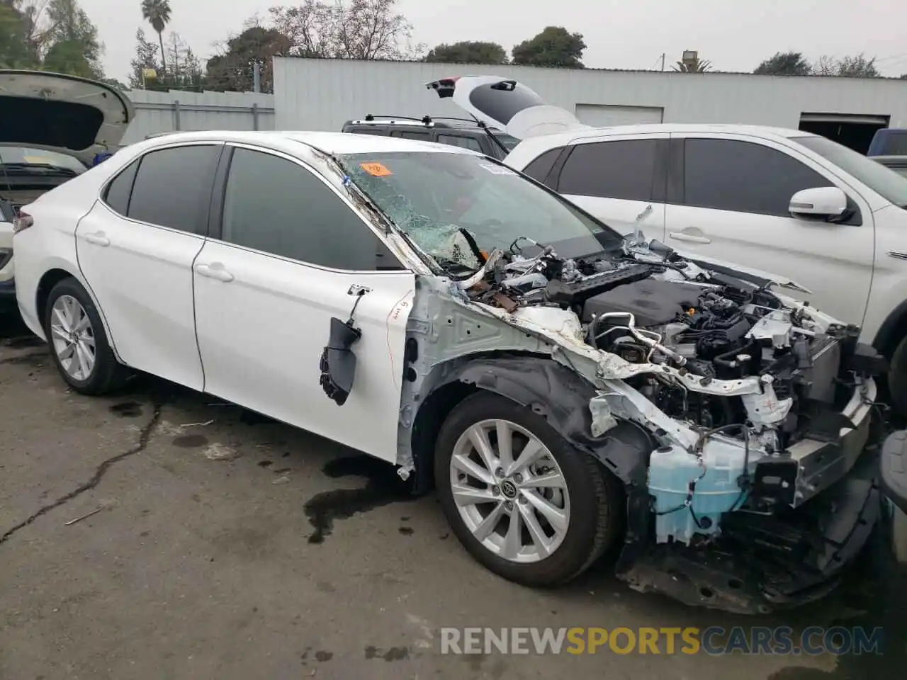 4 Photograph of a damaged car 4T1C11AK5NU021194 TOYOTA CAMRY 2022