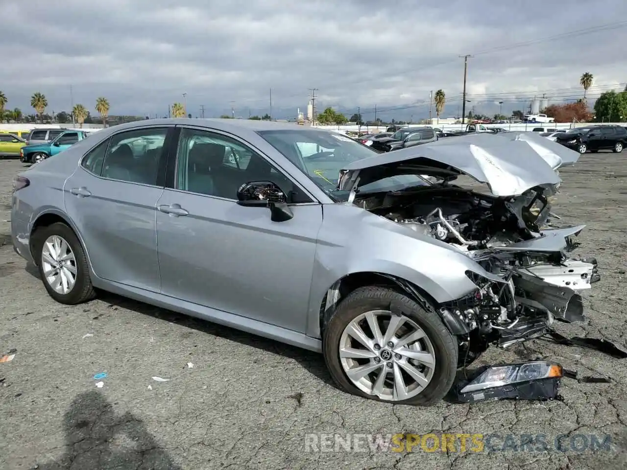 4 Photograph of a damaged car 4T1C11AK5NU711284 TOYOTA CAMRY 2022