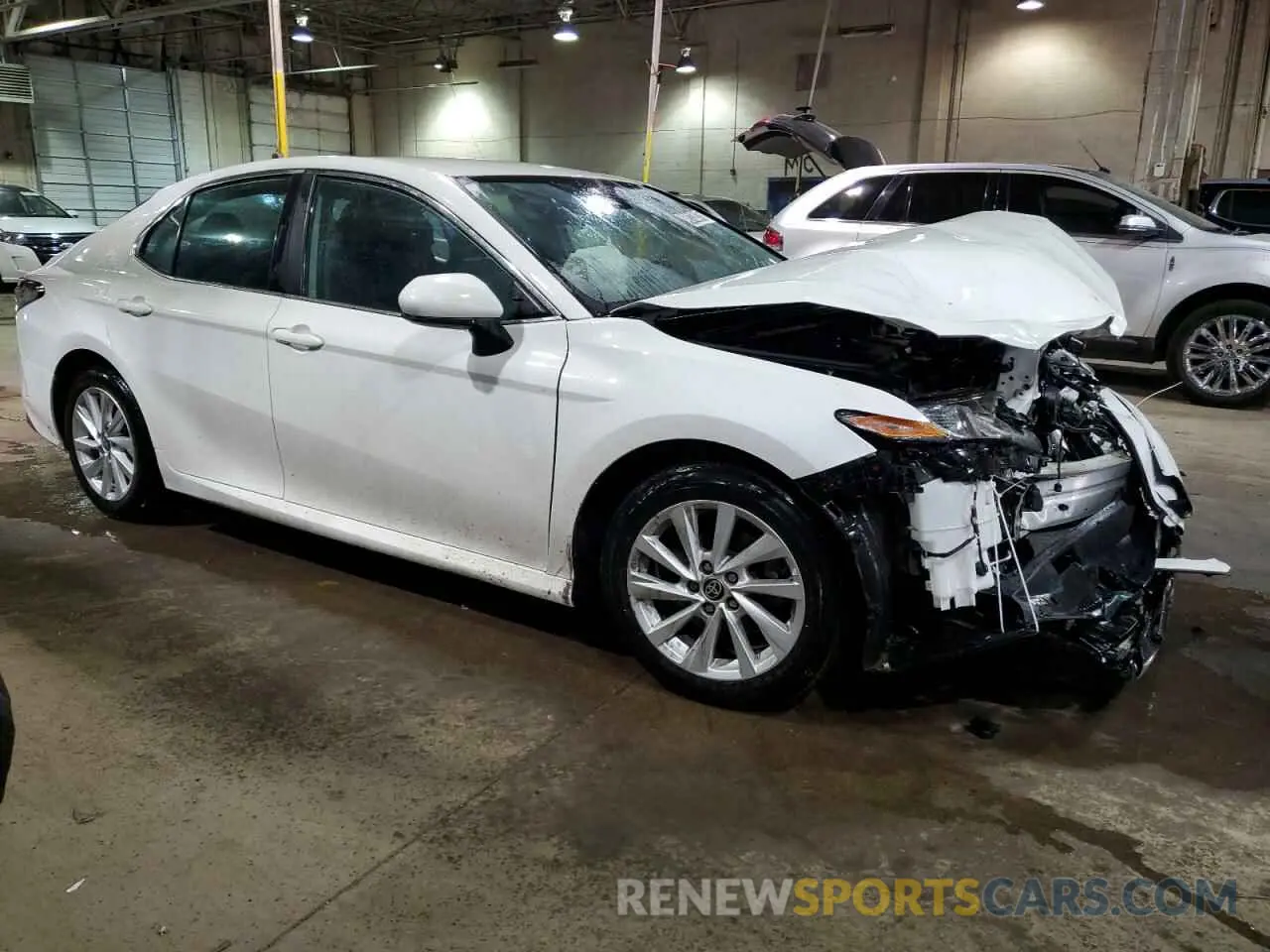 4 Photograph of a damaged car 4T1C11AK6NU654674 TOYOTA CAMRY 2022
