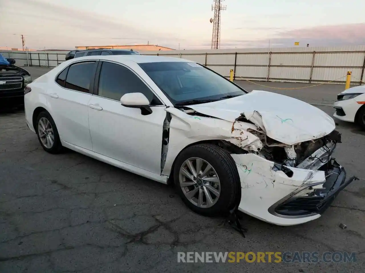 4 Photograph of a damaged car 4T1C11AK7NU696402 TOYOTA CAMRY 2022