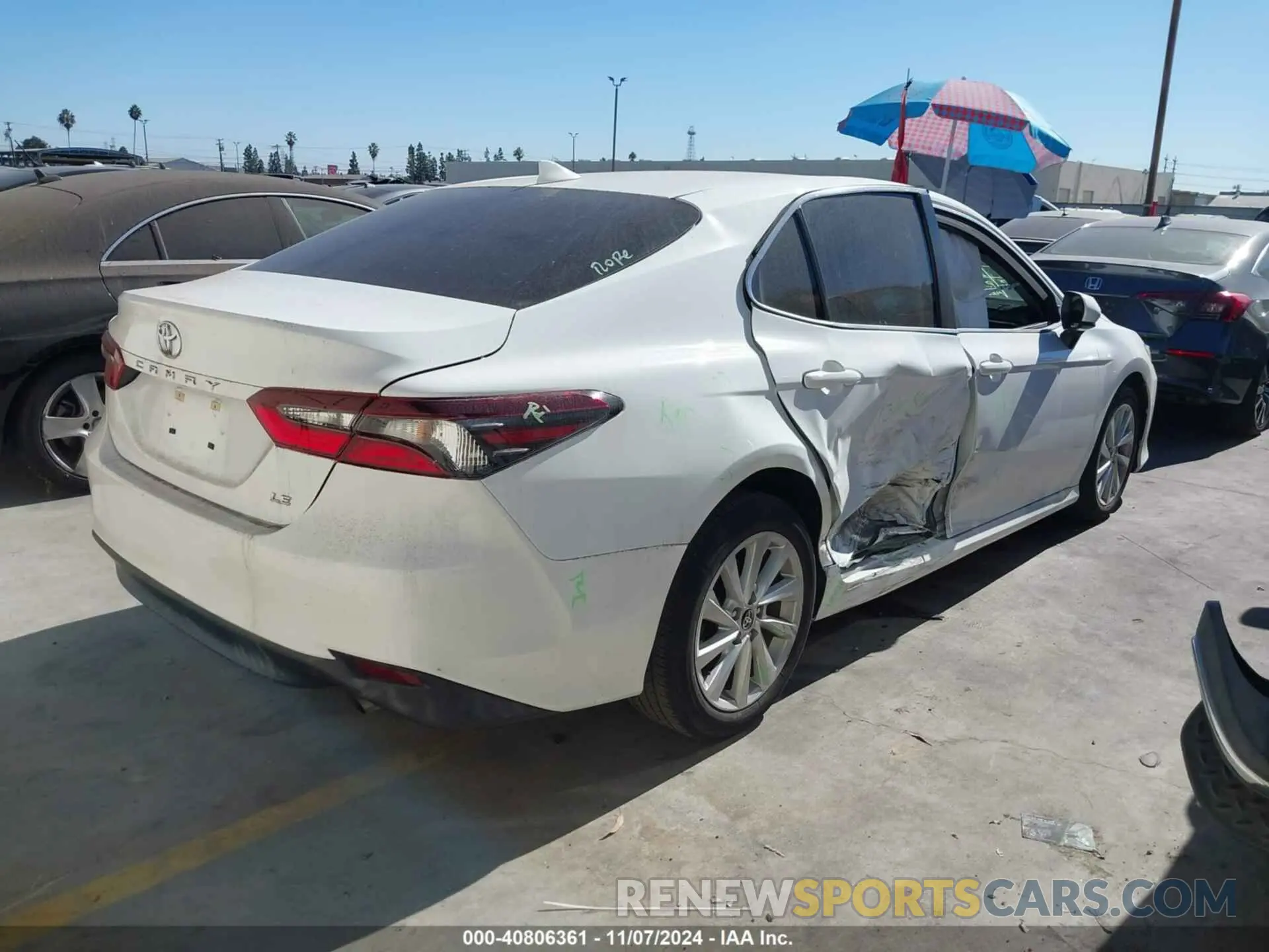 4 Photograph of a damaged car 4T1C11AK7NU697131 TOYOTA CAMRY 2022