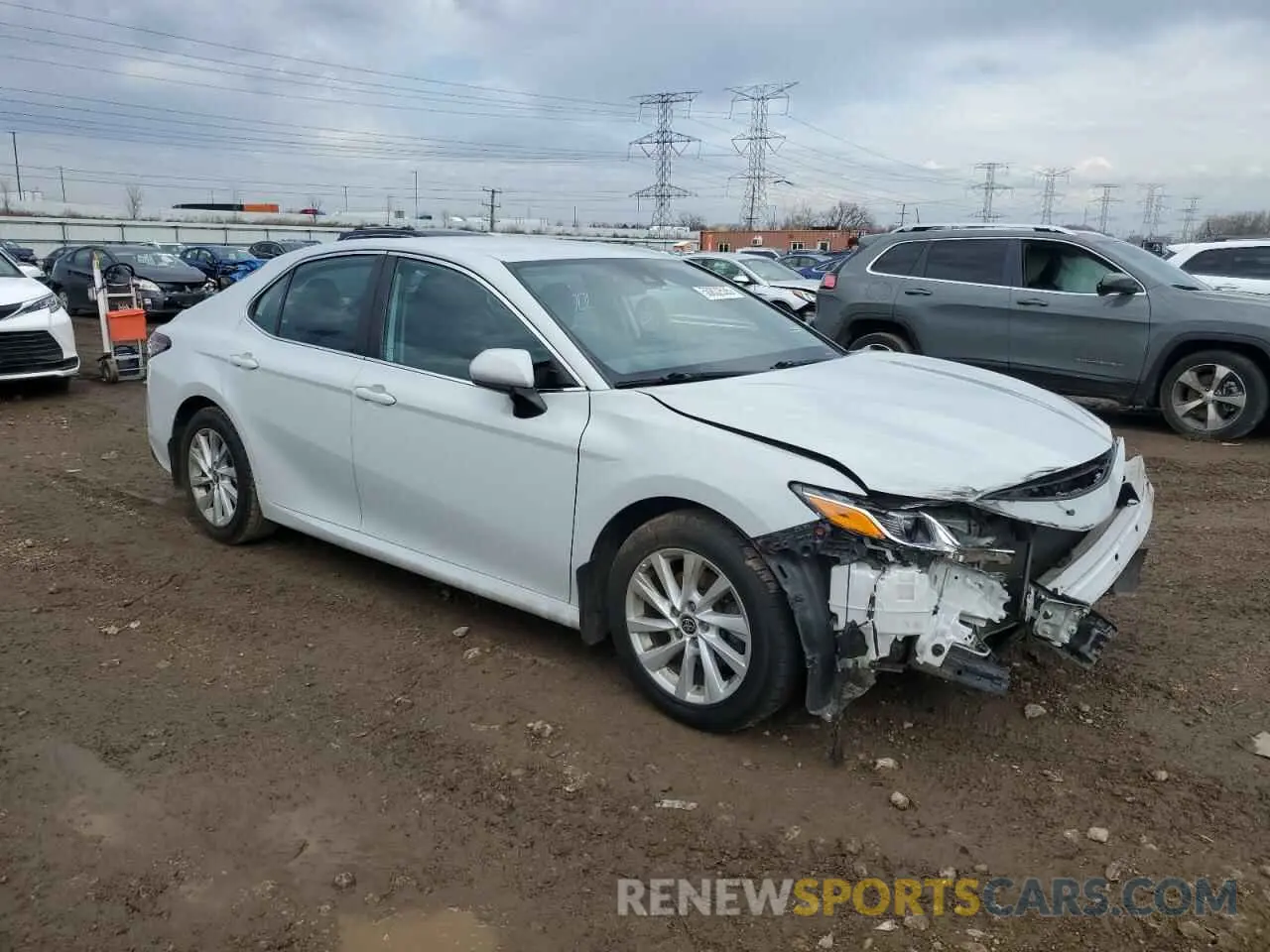4 Photograph of a damaged car 4T1C11AK9NU039617 TOYOTA CAMRY 2022