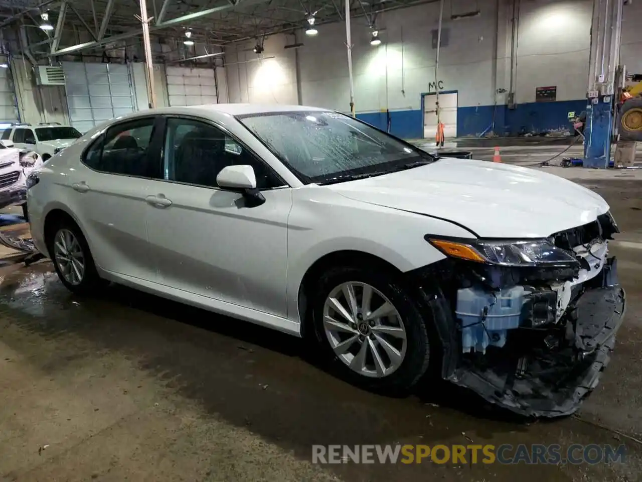 4 Photograph of a damaged car 4T1C11AKXNU623010 TOYOTA CAMRY 2022