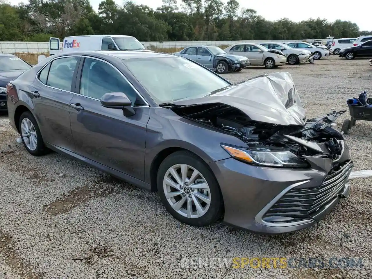 4 Photograph of a damaged car 4T1C11AKXNU624223 TOYOTA CAMRY 2022