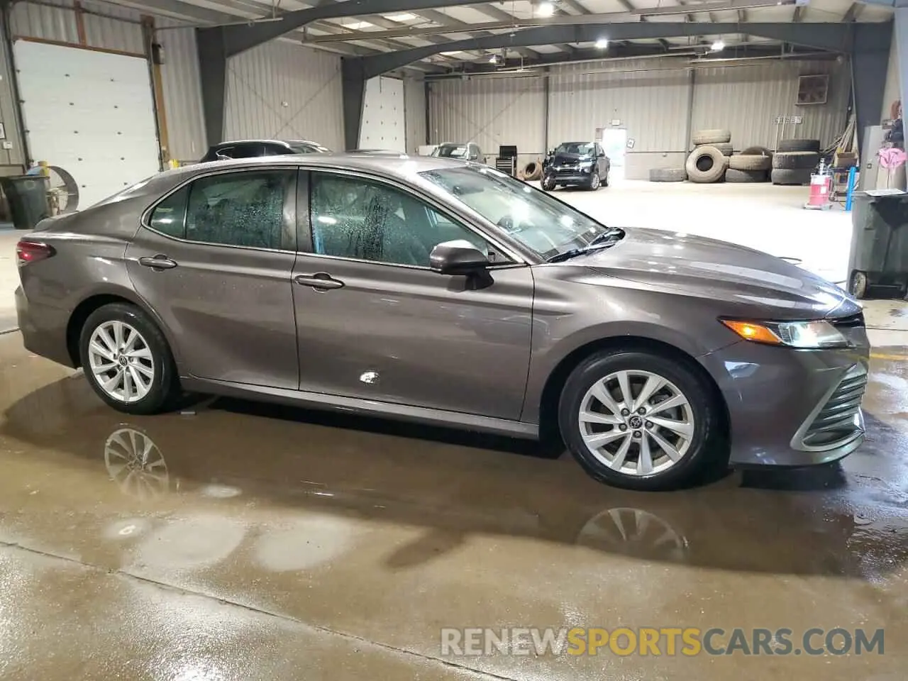 4 Photograph of a damaged car 4T1C11AKXNU625520 TOYOTA CAMRY 2022
