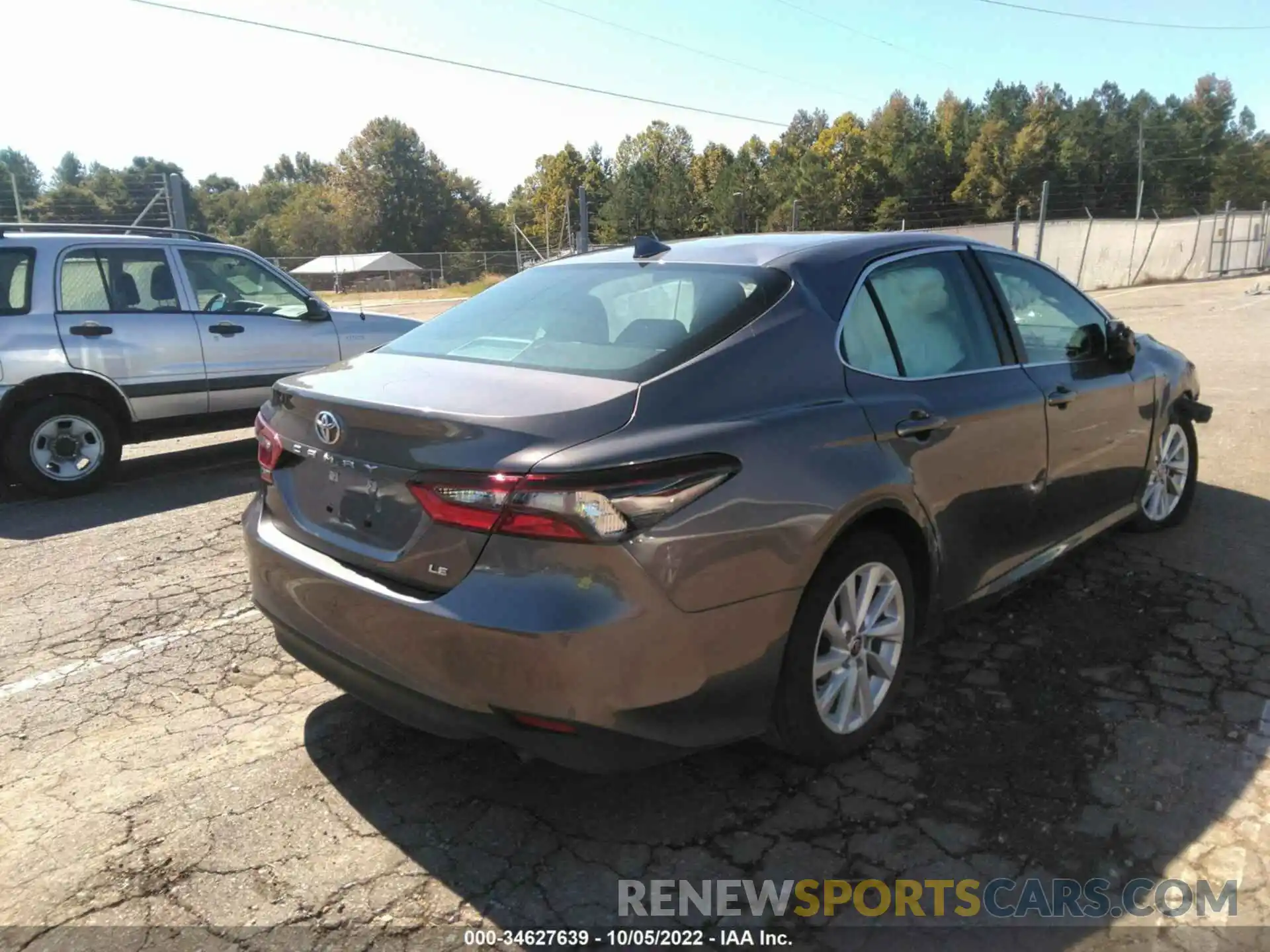 4 Photograph of a damaged car 4T1C11AKXNU627817 TOYOTA CAMRY 2022