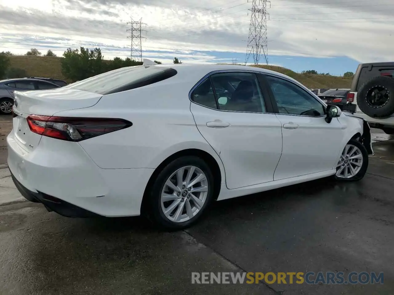 3 Photograph of a damaged car 4T1C11AKXNU628384 TOYOTA CAMRY 2022