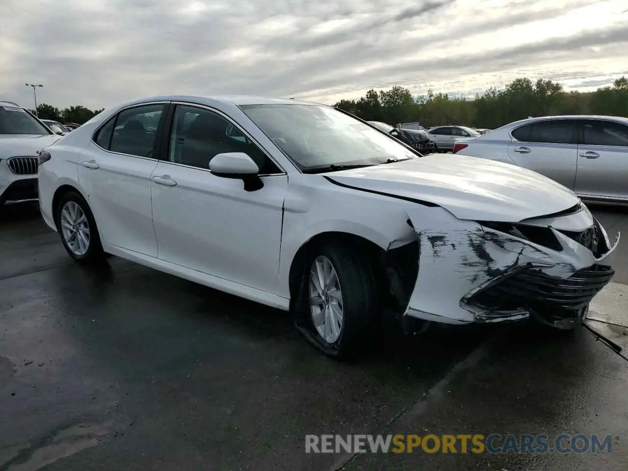 4 Photograph of a damaged car 4T1C11AKXNU628384 TOYOTA CAMRY 2022