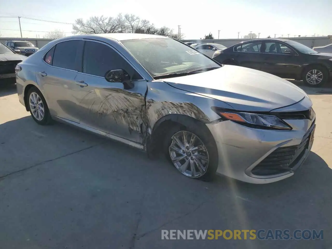 4 Photograph of a damaged car 4T1C11AKXNU637599 TOYOTA CAMRY 2022