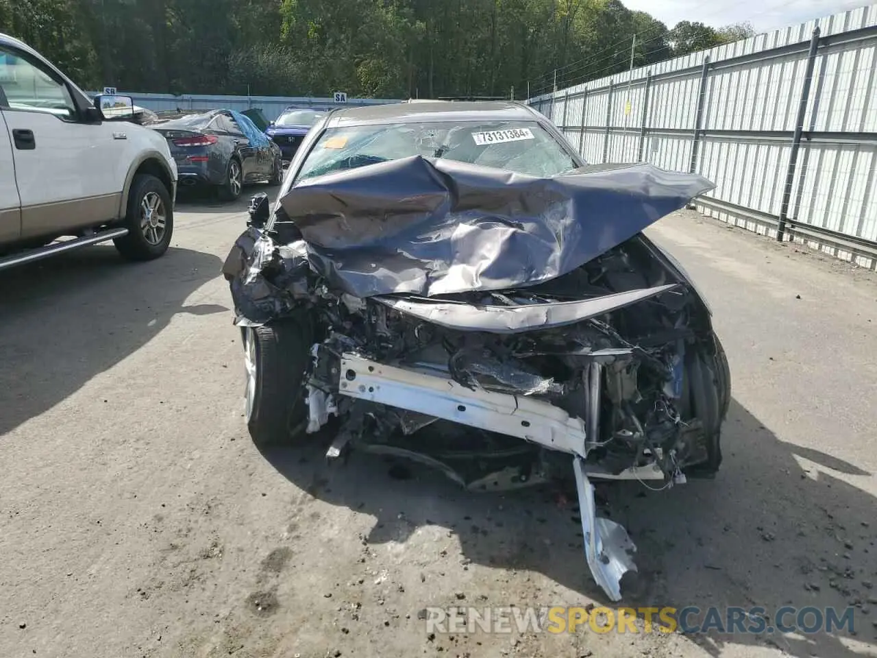 5 Photograph of a damaged car 4T1C11AKXNU648618 TOYOTA CAMRY 2022