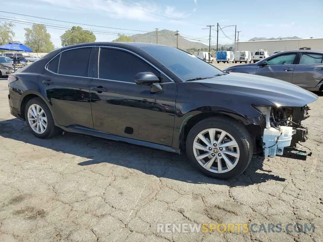 4 Photograph of a damaged car 4T1C11AKXNU661532 TOYOTA CAMRY 2022