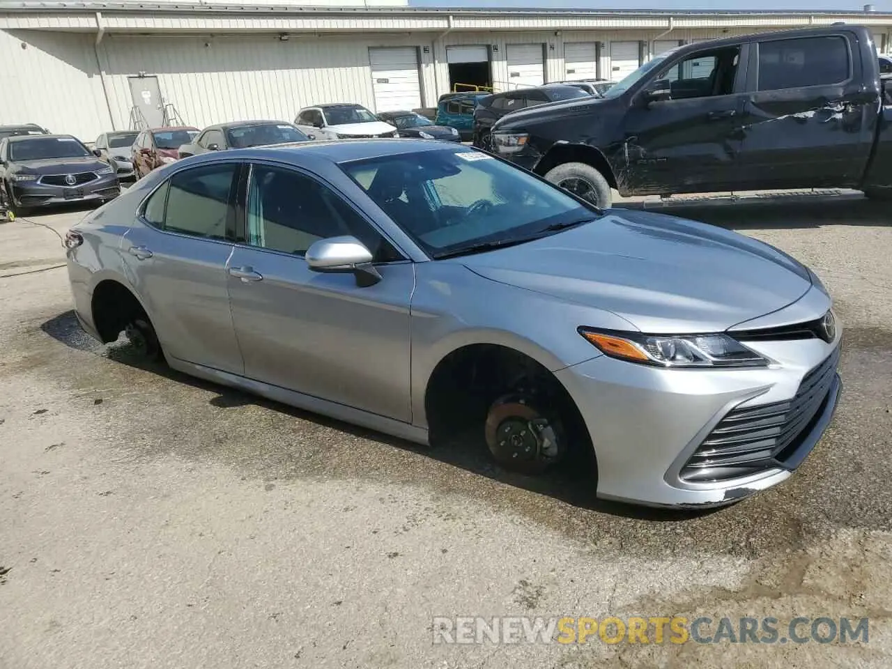 4 Photograph of a damaged car 4T1C11AKXNU665581 TOYOTA CAMRY 2022