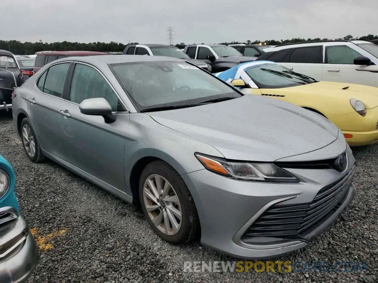 4 Photograph of a damaged car 4T1C11AKXNU666505 TOYOTA CAMRY 2022