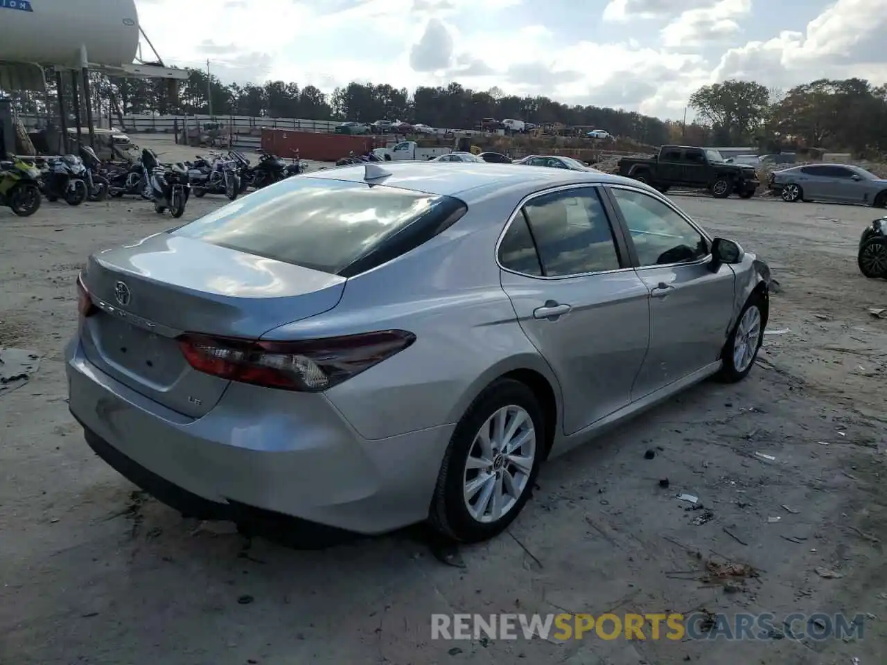 4 Photograph of a damaged car 4T1C11AKXNU668075 TOYOTA CAMRY 2022