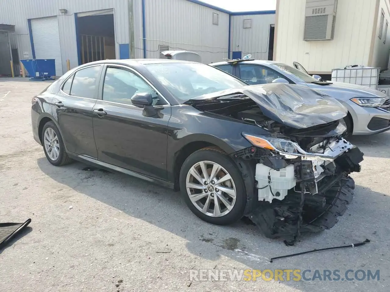 4 Photograph of a damaged car 4T1C11AKXNU670814 TOYOTA CAMRY 2022