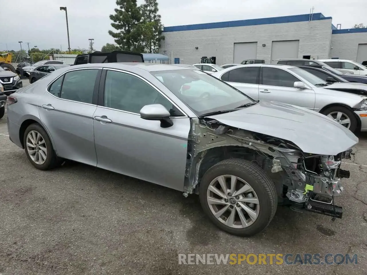 4 Photograph of a damaged car 4T1C11AKXNU671672 TOYOTA CAMRY 2022