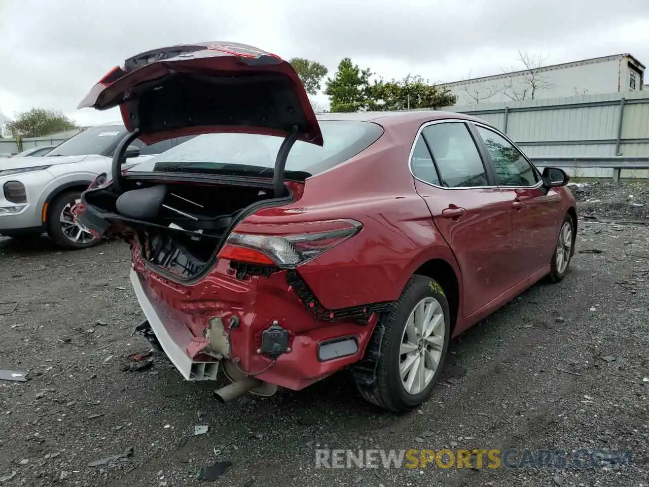 4 Photograph of a damaged car 4T1C11AKXNU672241 TOYOTA CAMRY 2022