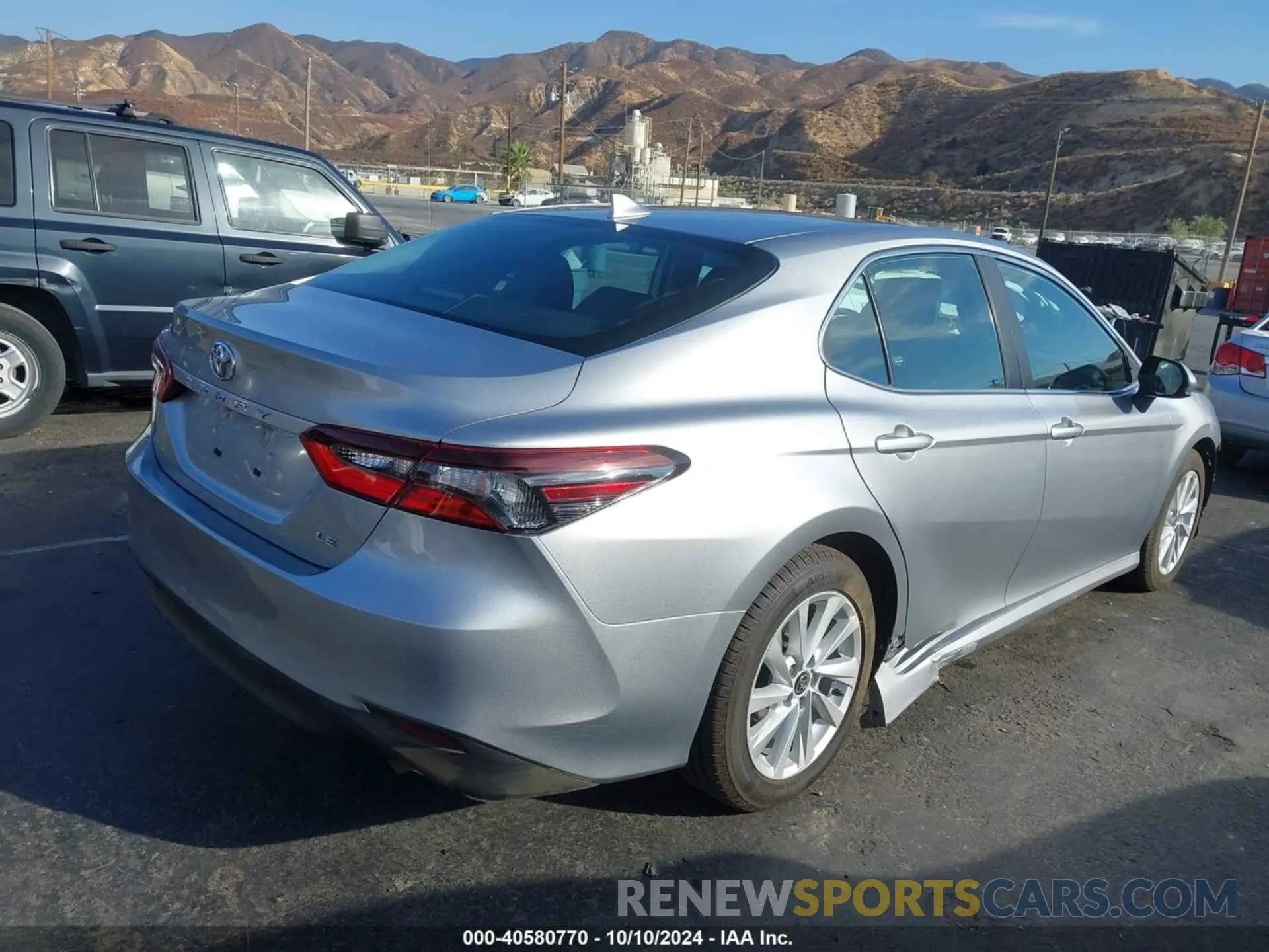 4 Photograph of a damaged car 4T1C11AKXNU674040 TOYOTA CAMRY 2022