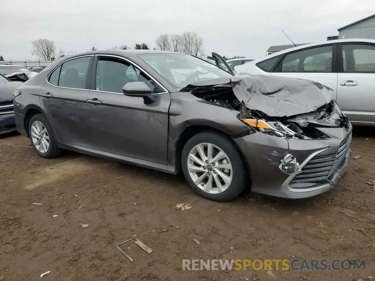 4 Photograph of a damaged car 4T1C11AKXNU679870 TOYOTA CAMRY 2022