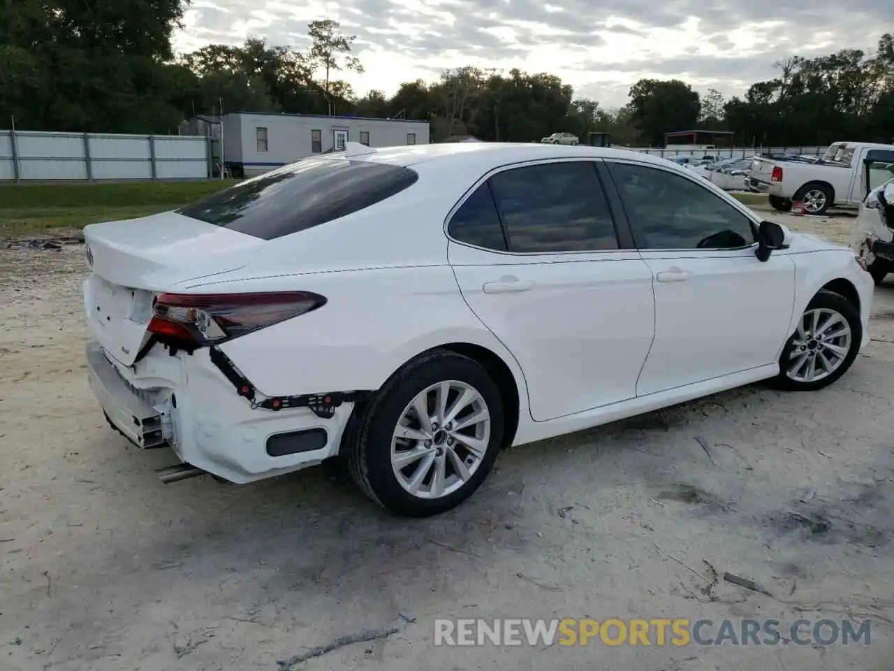 3 Photograph of a damaged car 4T1C11AKXNU684261 TOYOTA CAMRY 2022