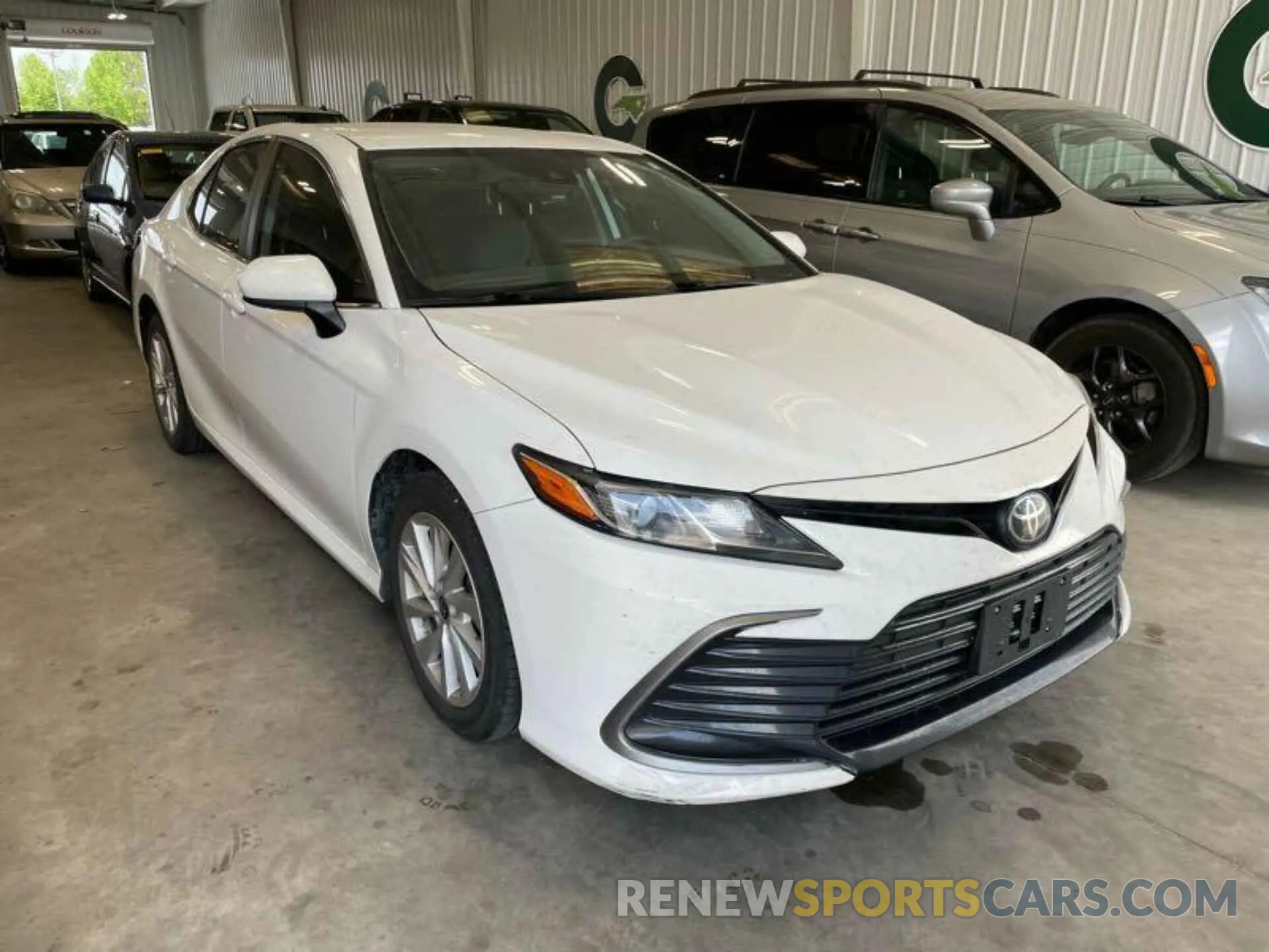 12 Photograph of a damaged car 4T1C11BK0NU057907 TOYOTA CAMRY 2022