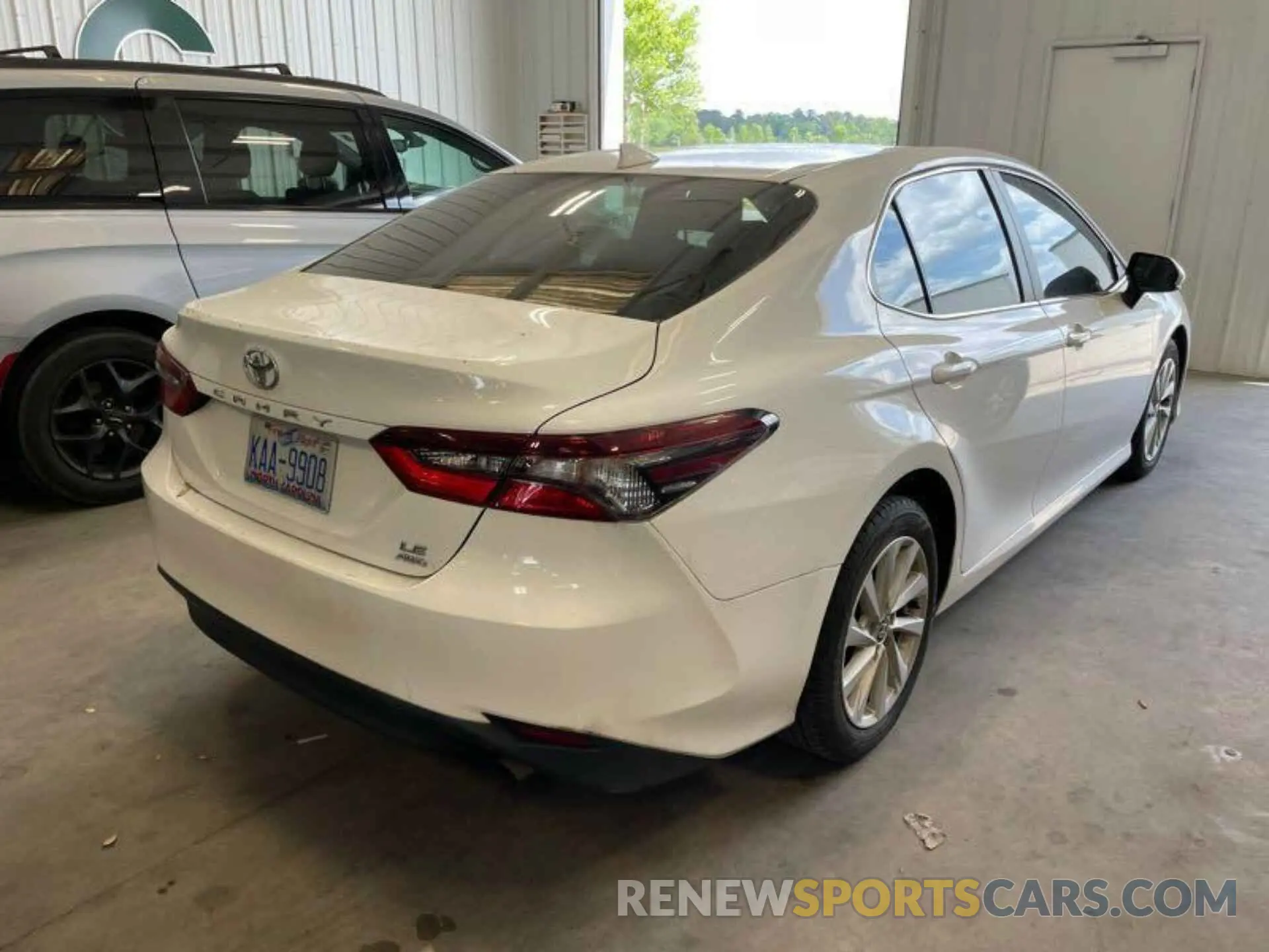 4 Photograph of a damaged car 4T1C11BK0NU057907 TOYOTA CAMRY 2022