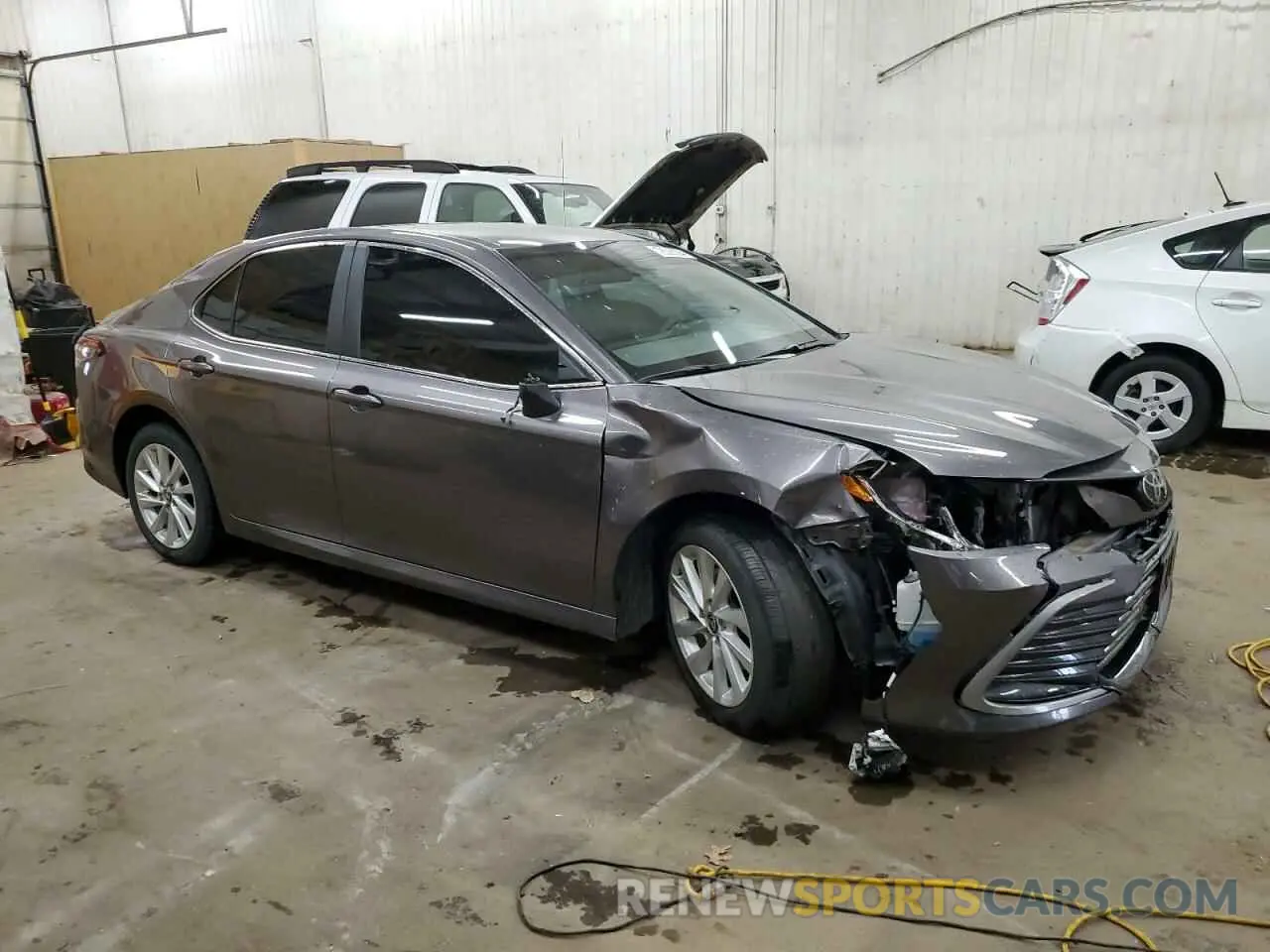 4 Photograph of a damaged car 4T1C11BK7NU066622 TOYOTA CAMRY 2022