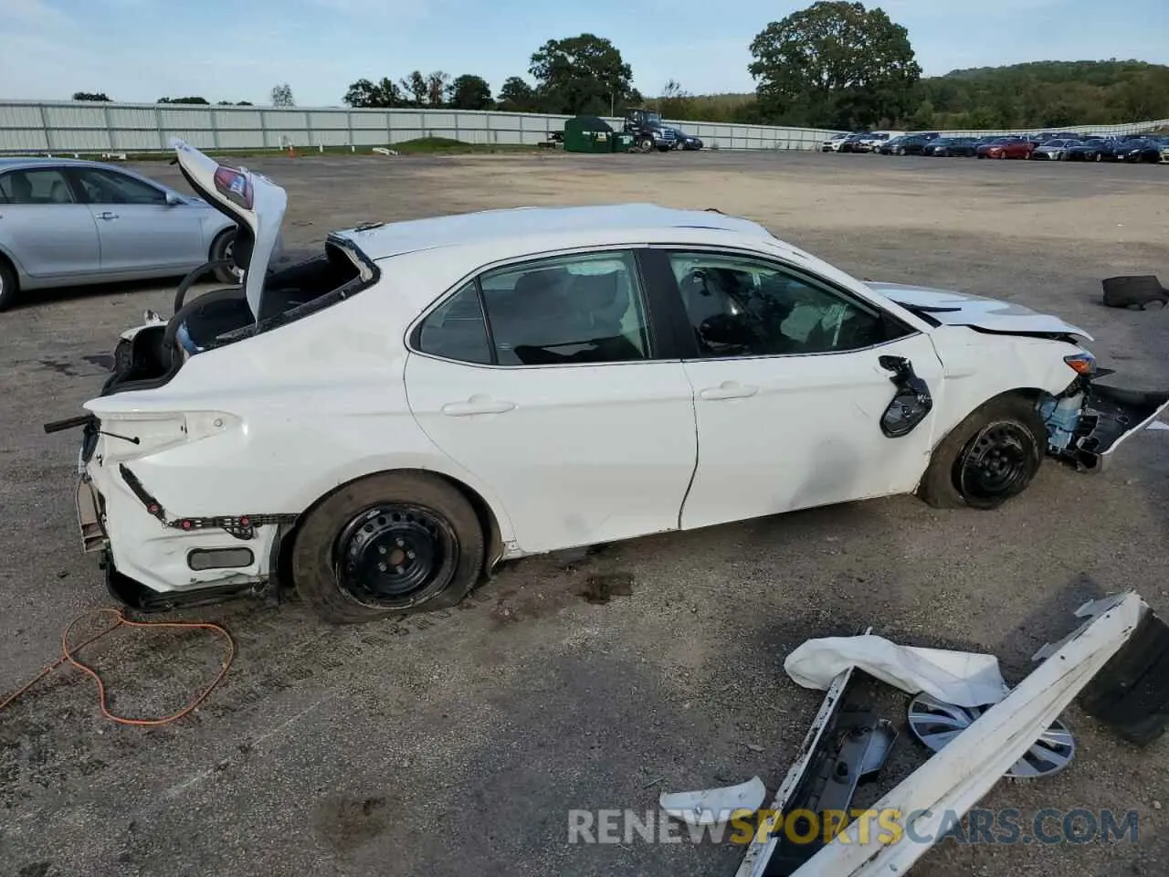 3 Photograph of a damaged car 4T1C31AK7NU577307 TOYOTA CAMRY 2022