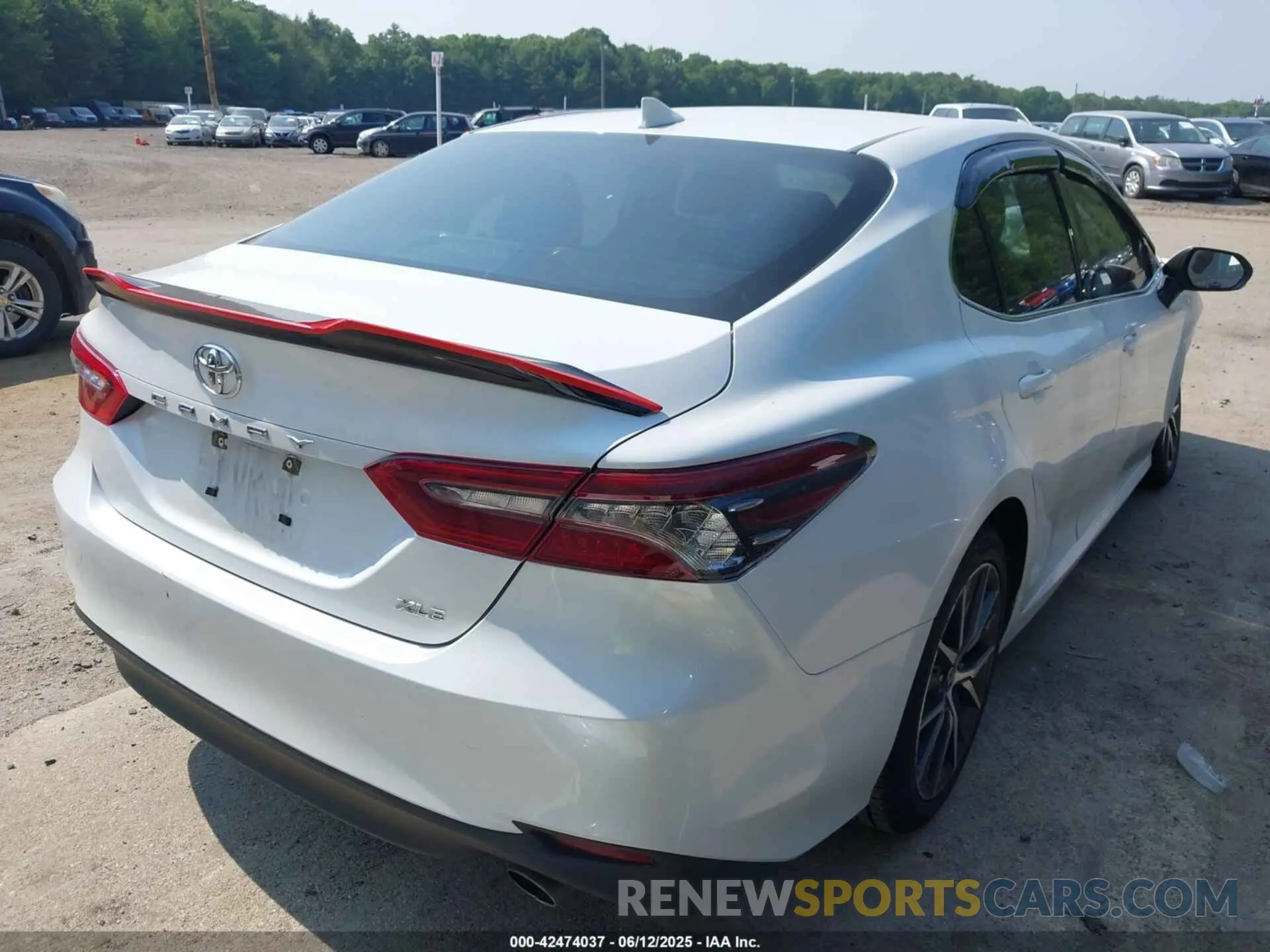 4 Photograph of a damaged car 4T1F11AK7NU702535 TOYOTA CAMRY 2022