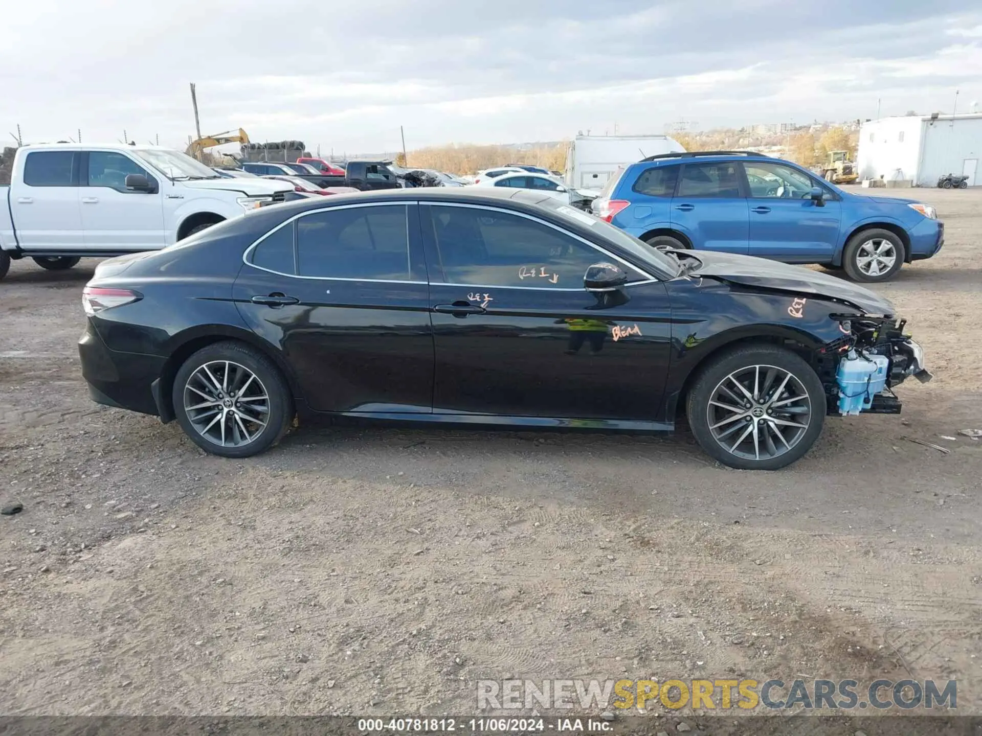 13 Photograph of a damaged car 4T1F11AKXNU718213 TOYOTA CAMRY 2022