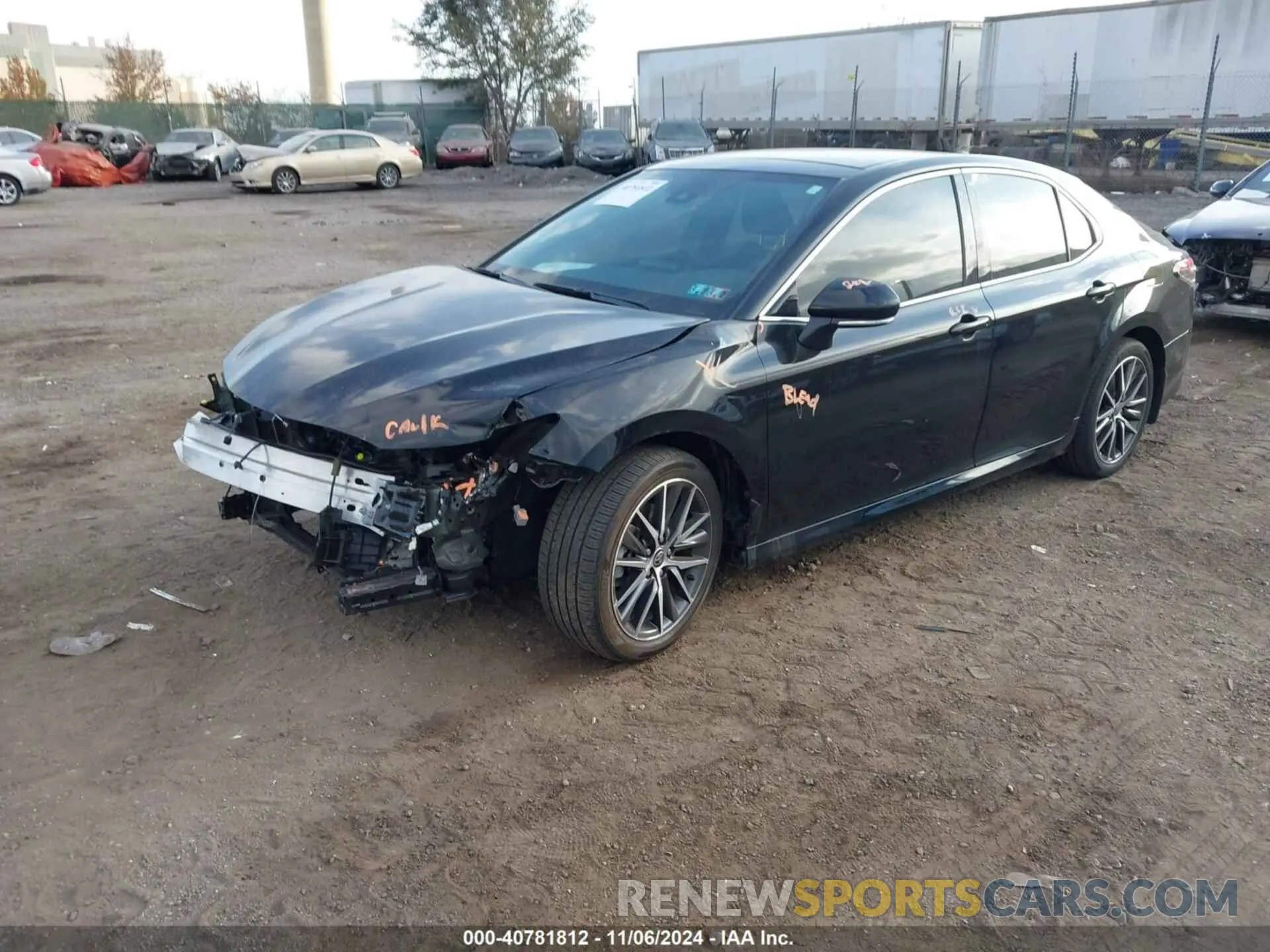 2 Photograph of a damaged car 4T1F11AKXNU718213 TOYOTA CAMRY 2022
