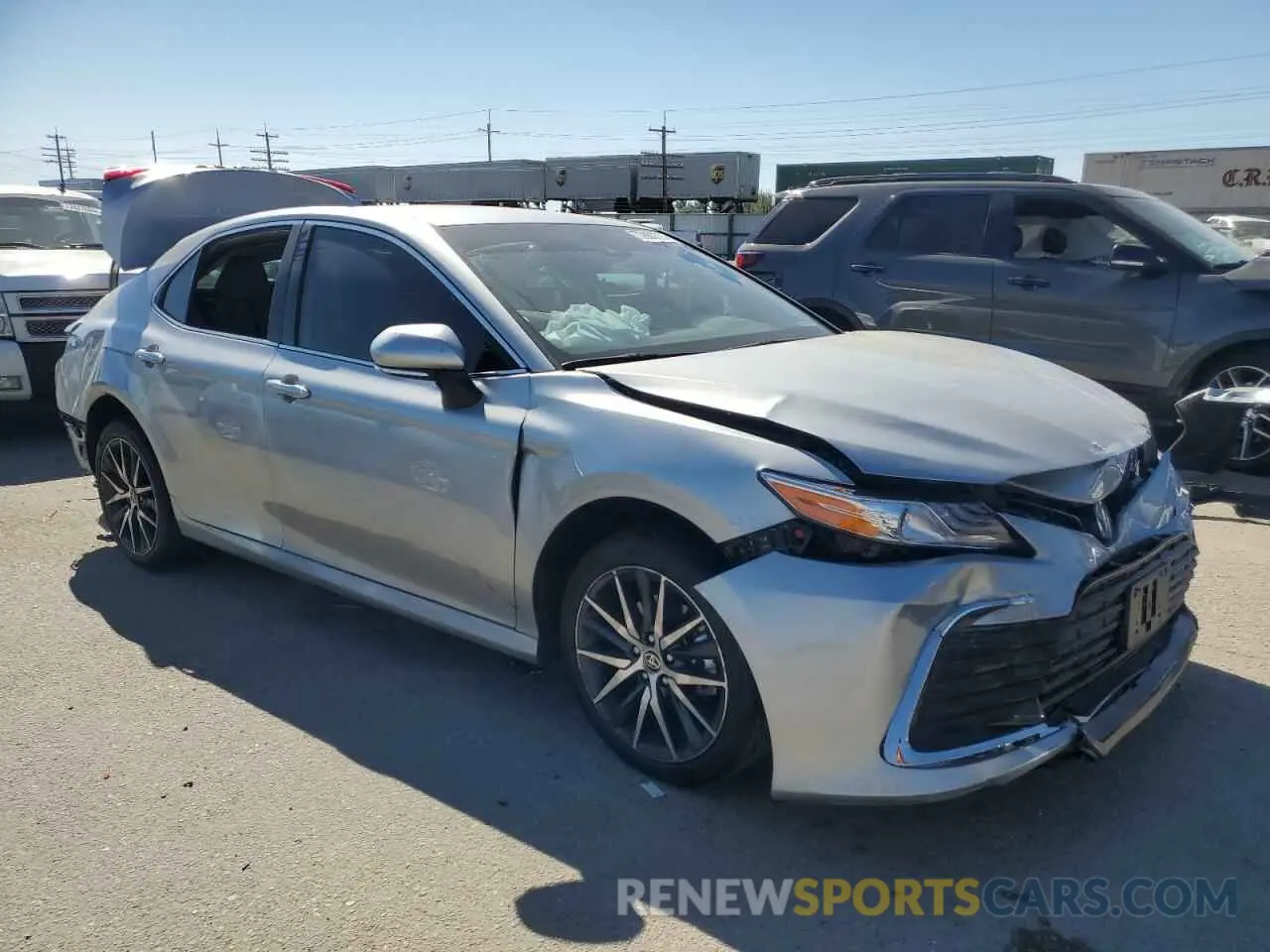 4 Photograph of a damaged car 4T1F31AK3NU586910 TOYOTA CAMRY 2022