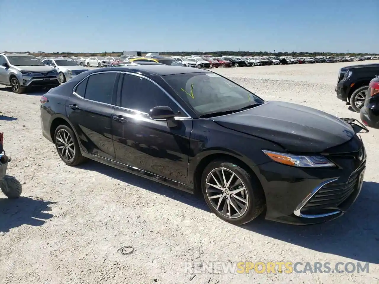 4 Photograph of a damaged car 4T1F31AKXNU584667 TOYOTA CAMRY 2022