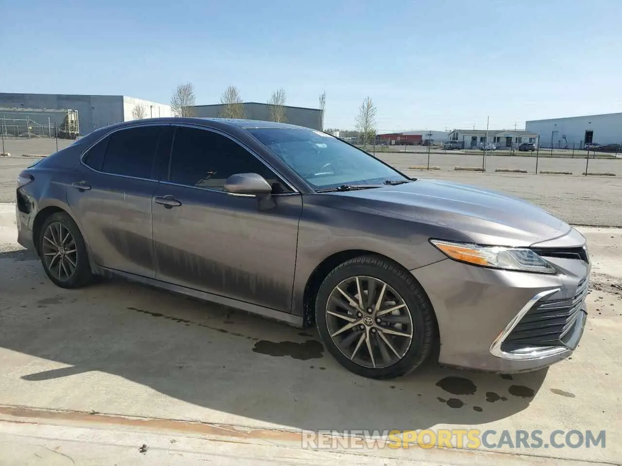 4 Photograph of a damaged car 4T1F31AKXNU596124 TOYOTA CAMRY 2022