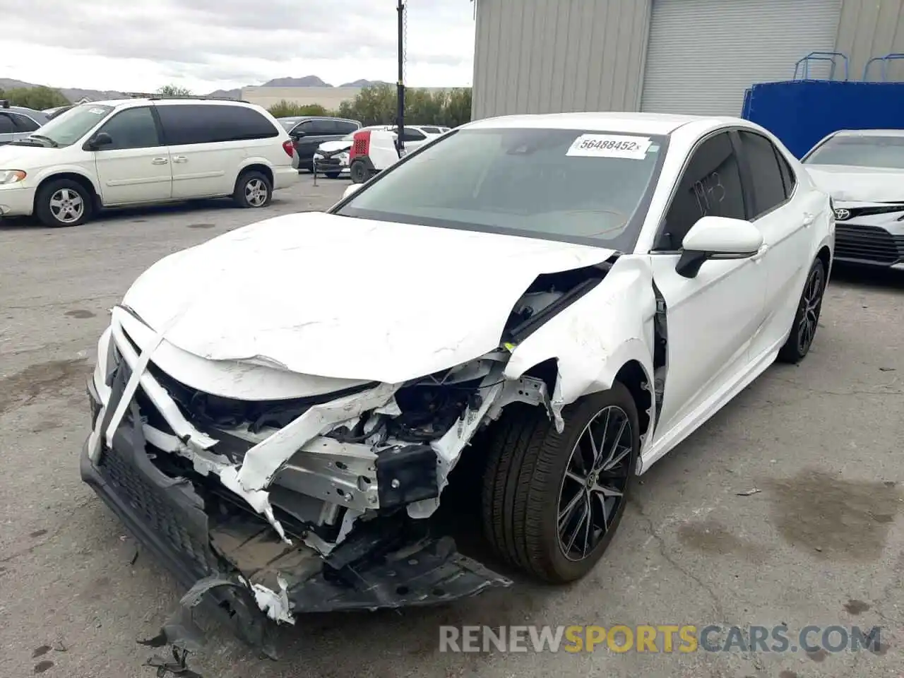 2 Photograph of a damaged car 4T1G11AK0NU043959 TOYOTA CAMRY 2022