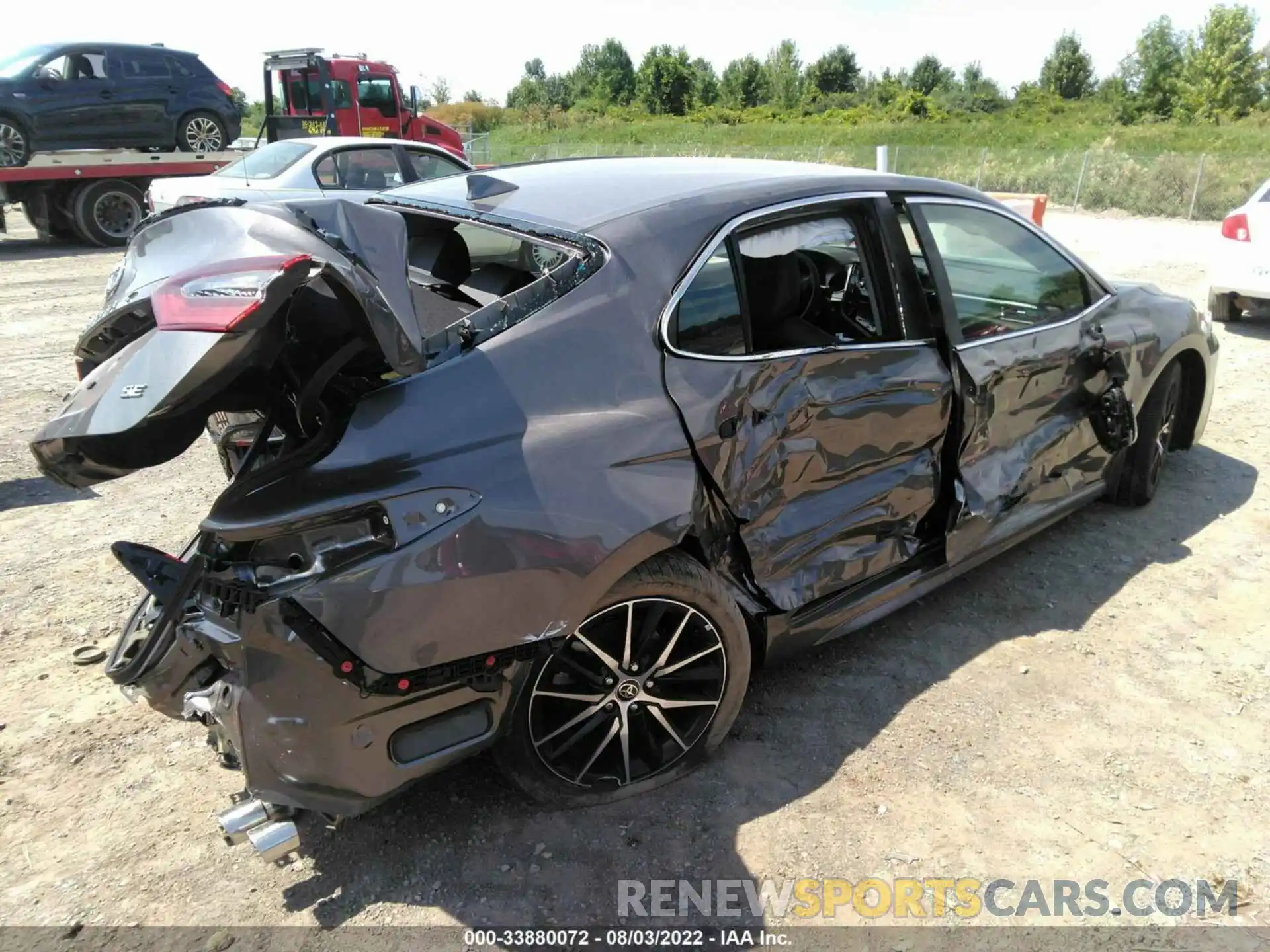 4 Photograph of a damaged car 4T1G11AK0NU700033 TOYOTA CAMRY 2022