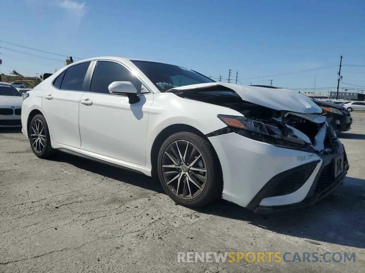 4 Photograph of a damaged car 4T1G11AK1NU656303 TOYOTA CAMRY 2022