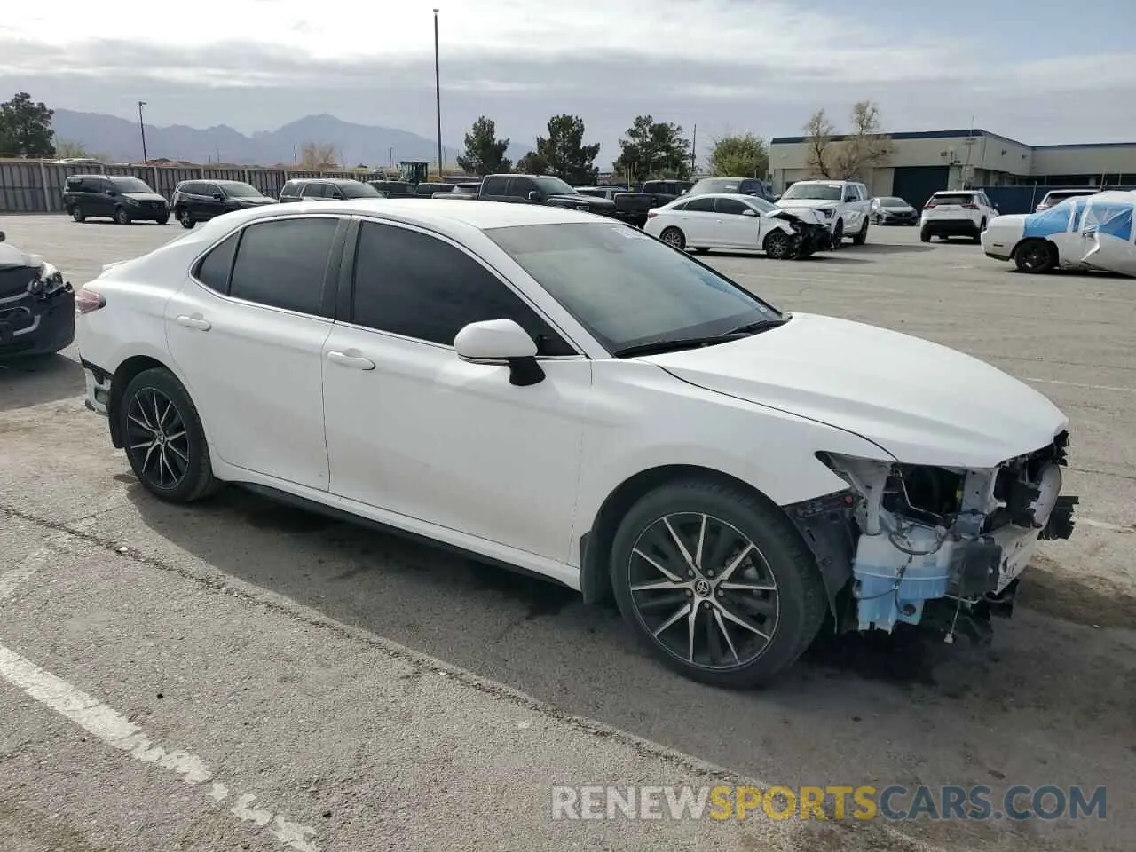 4 Photograph of a damaged car 4T1G11AK3NU691585 TOYOTA CAMRY 2022