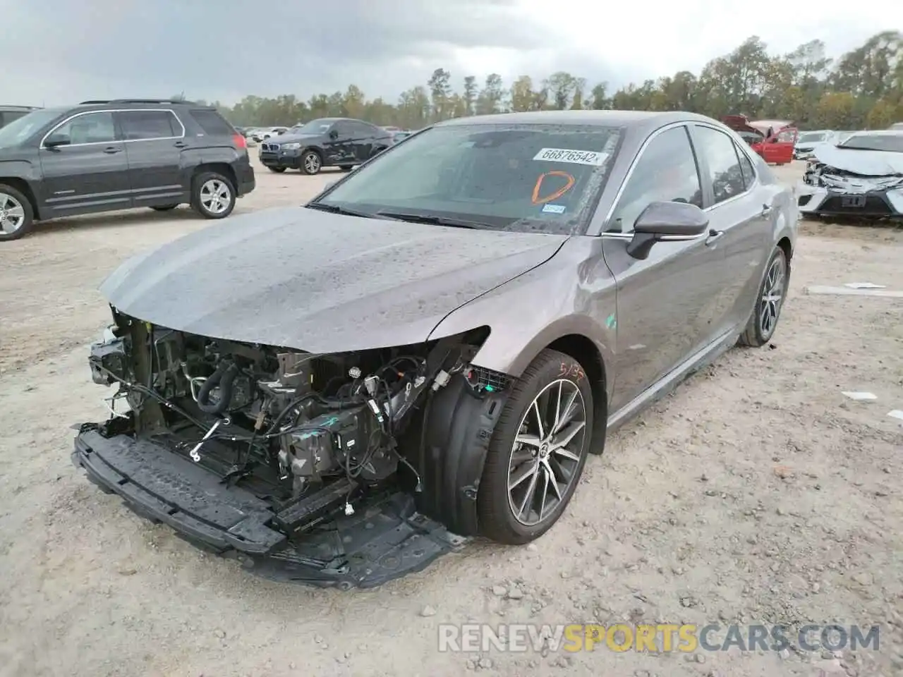 2 Photograph of a damaged car 4T1G11AK3NU711656 TOYOTA CAMRY 2022