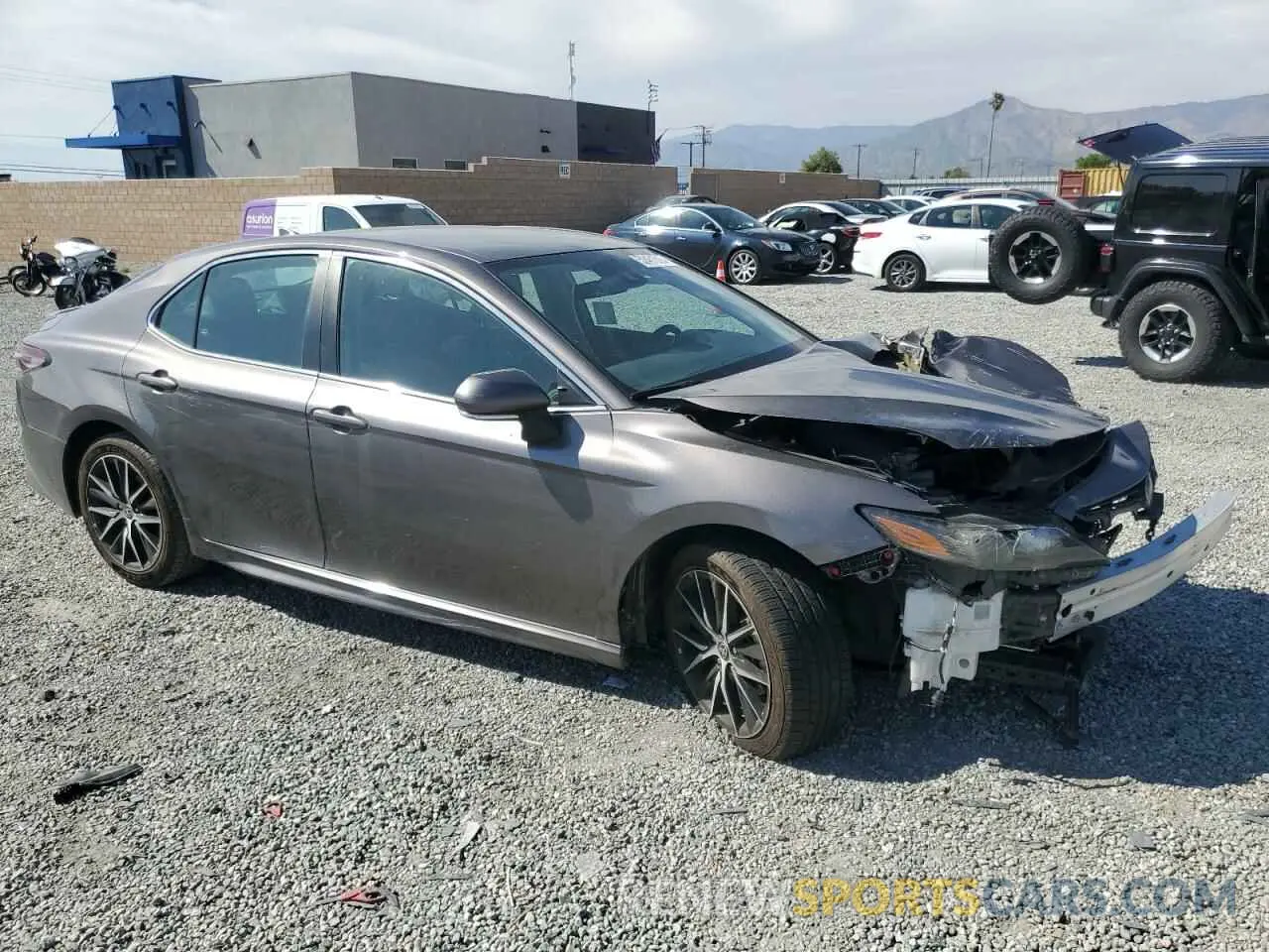 4 Photograph of a damaged car 4T1G11AK4NU684242 TOYOTA CAMRY 2022