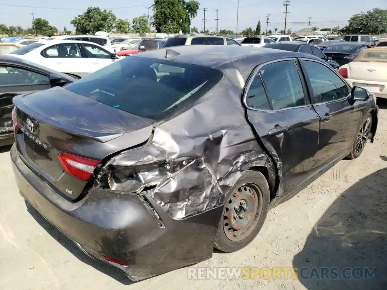 4 Photograph of a damaged car 4T1G11AK6NU623393 TOYOTA CAMRY 2022