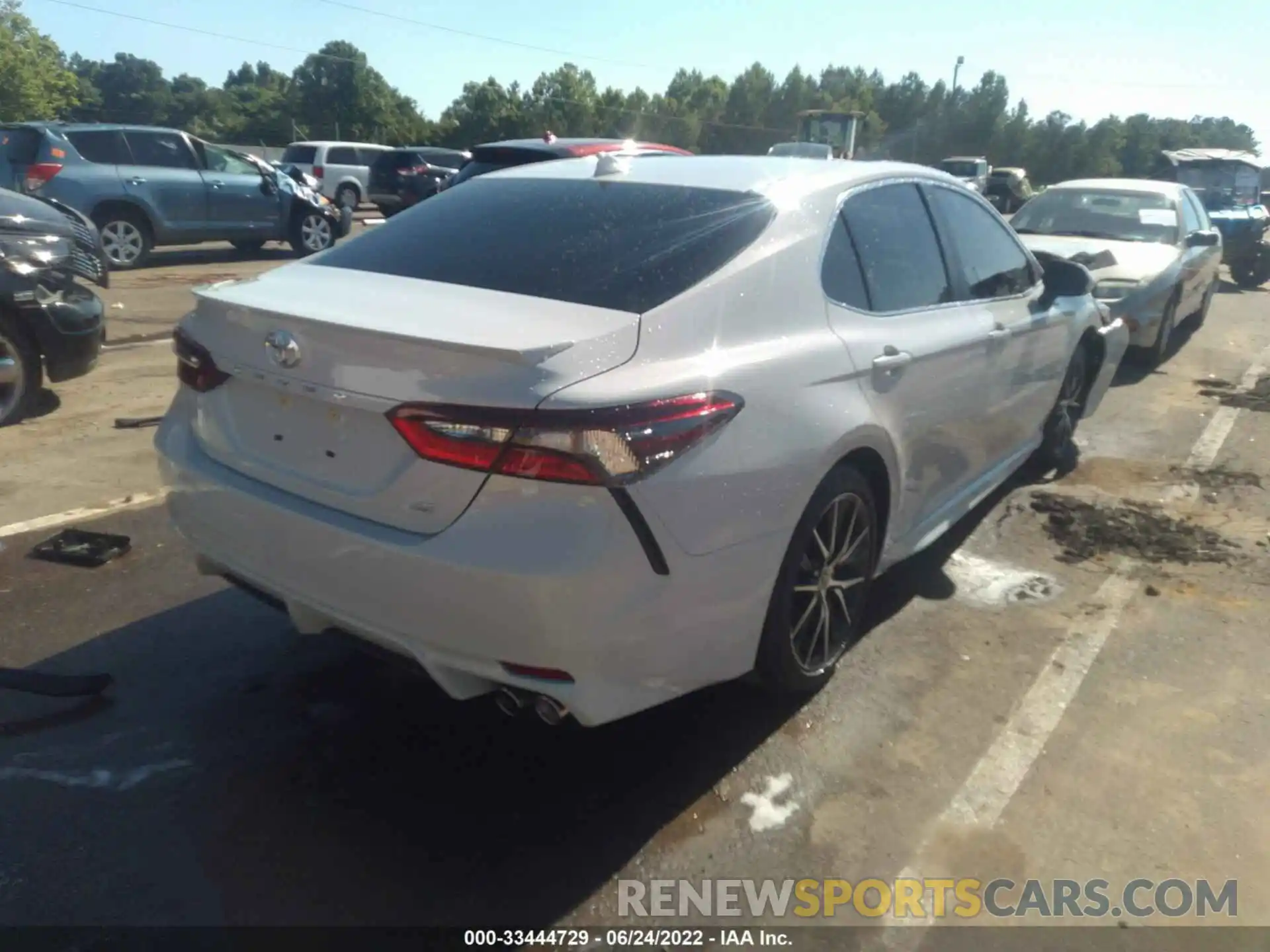 4 Photograph of a damaged car 4T1G11AKXNU021838 TOYOTA CAMRY 2022