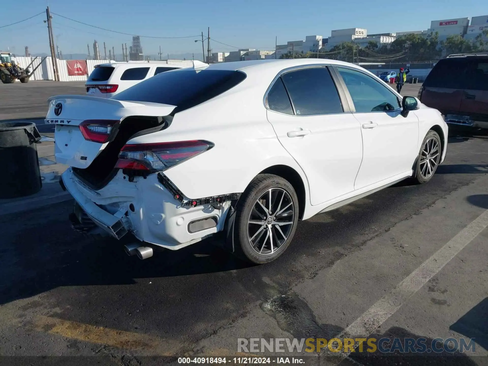 4 Photograph of a damaged car 4T1G11AKXNU044763 TOYOTA CAMRY 2022