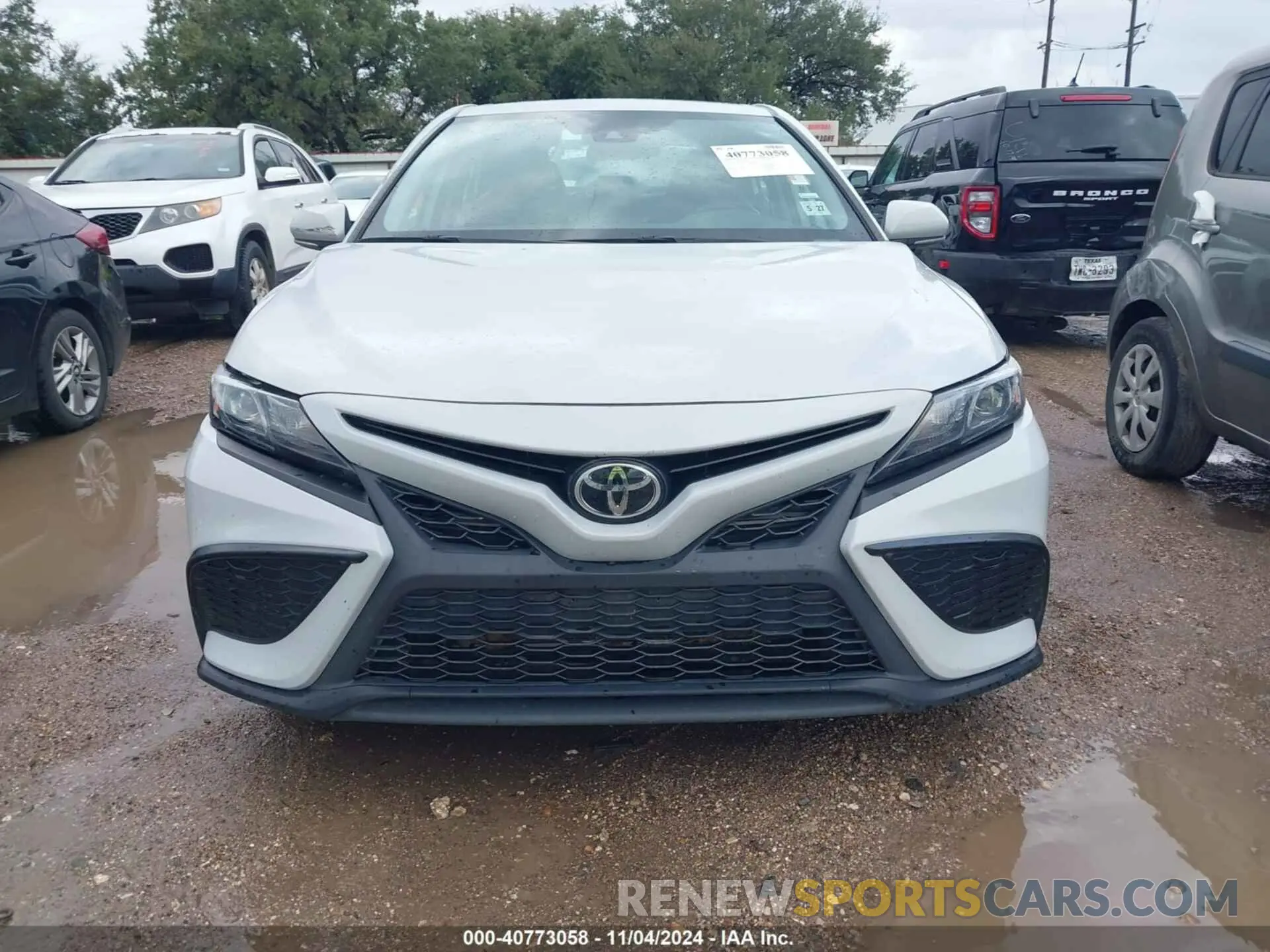 12 Photograph of a damaged car 4T1G11AKXNU052667 TOYOTA CAMRY 2022