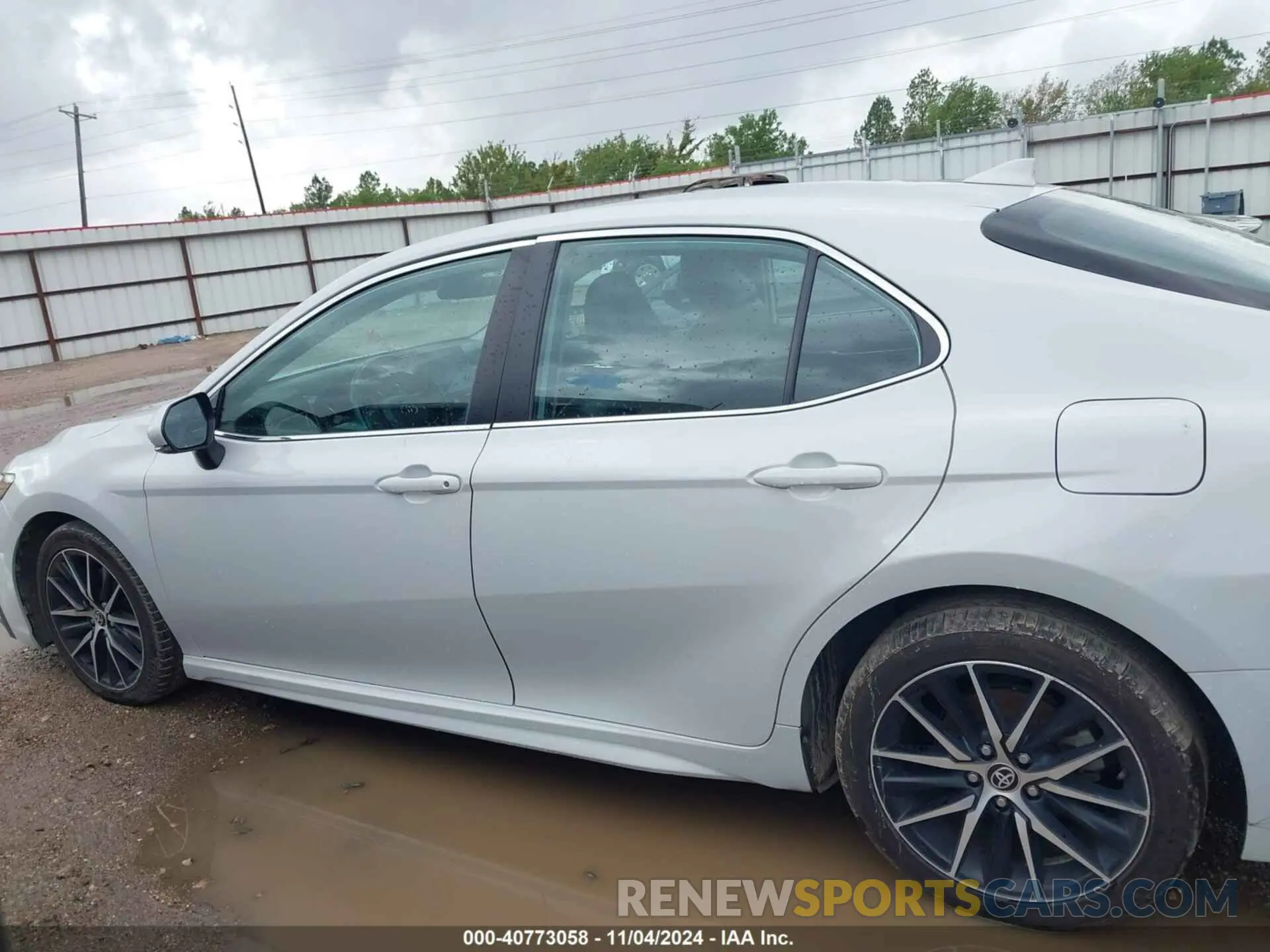 14 Photograph of a damaged car 4T1G11AKXNU052667 TOYOTA CAMRY 2022