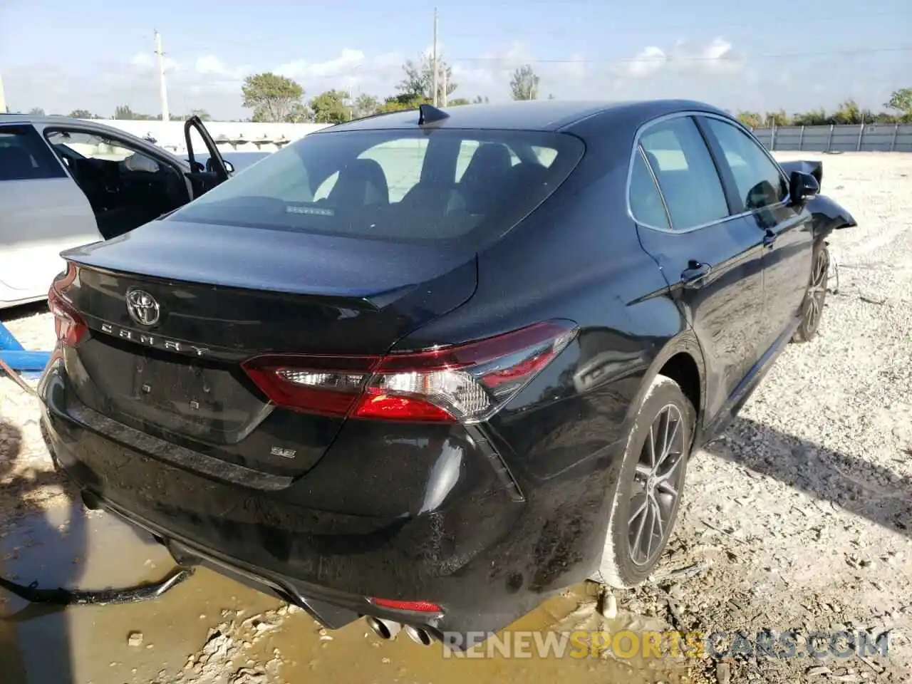 4 Photograph of a damaged car 4T1G11AKXNU627673 TOYOTA CAMRY 2022