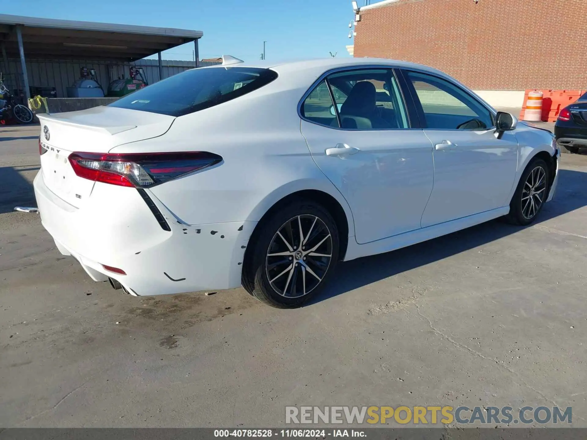 4 Photograph of a damaged car 4T1G11AKXNU637362 TOYOTA CAMRY 2022