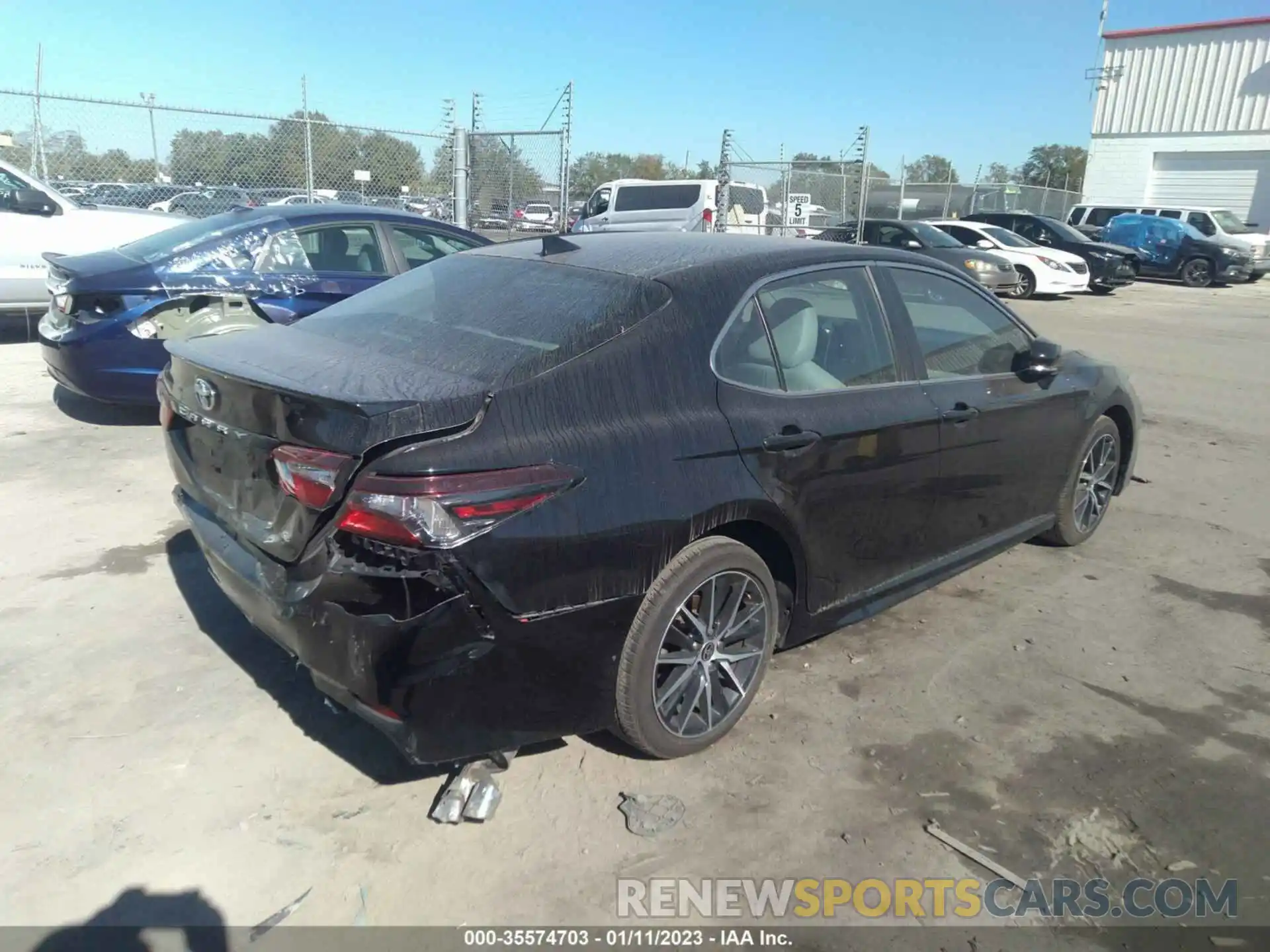 4 Photograph of a damaged car 4T1G11AKXNU643498 TOYOTA CAMRY 2022