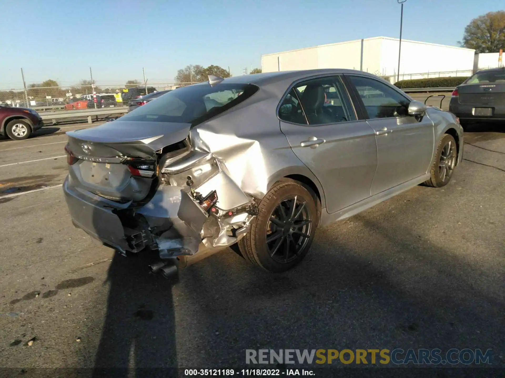 4 Photograph of a damaged car 4T1G11AKXNU648992 TOYOTA CAMRY 2022