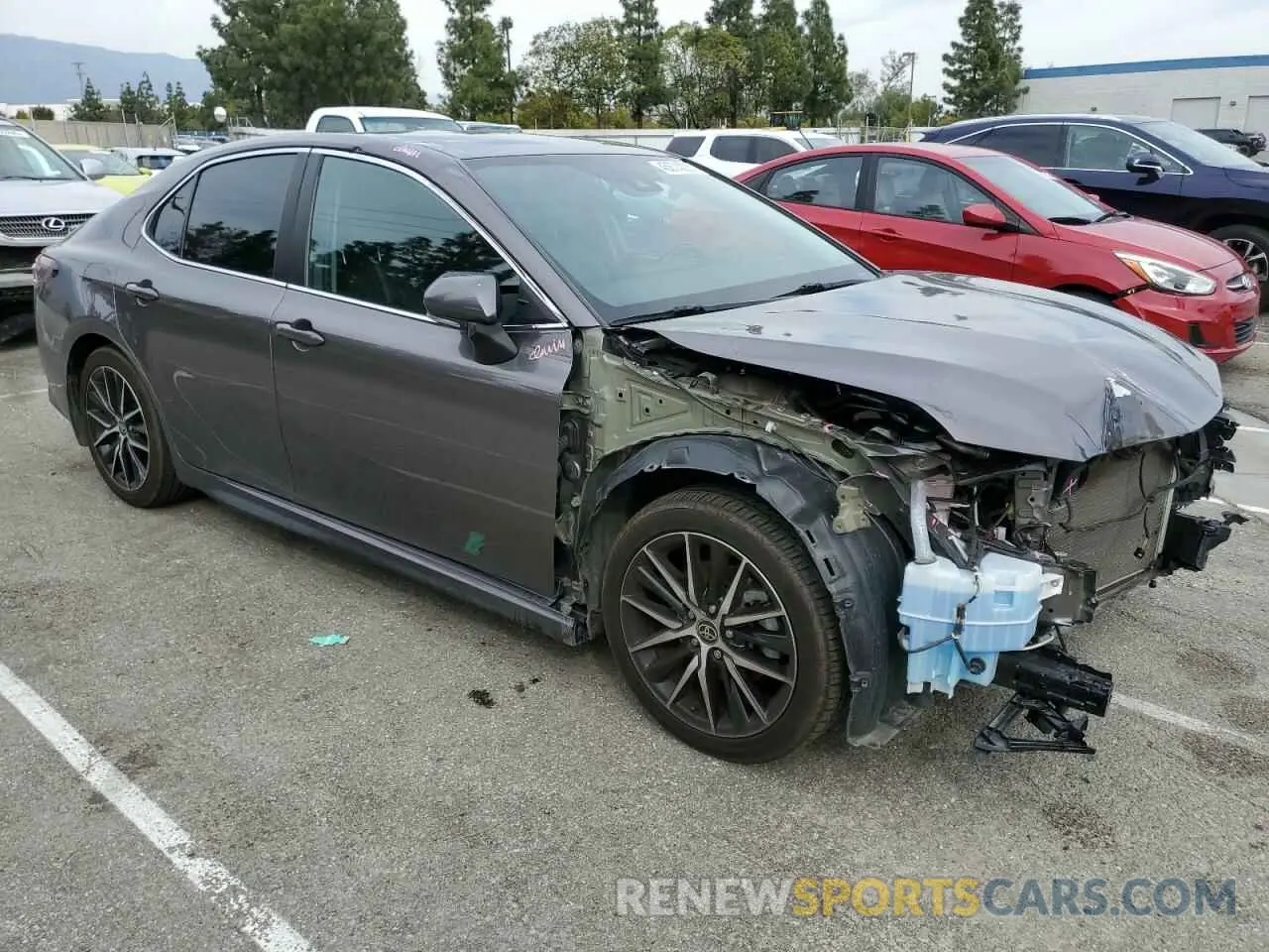 4 Photograph of a damaged car 4T1G11AKXNU649611 TOYOTA CAMRY 2022